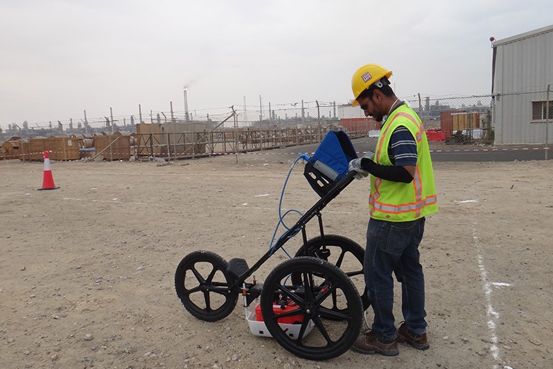 Specialist conducting Ground Penetrating Radar (GPR) scanning services in Qatar